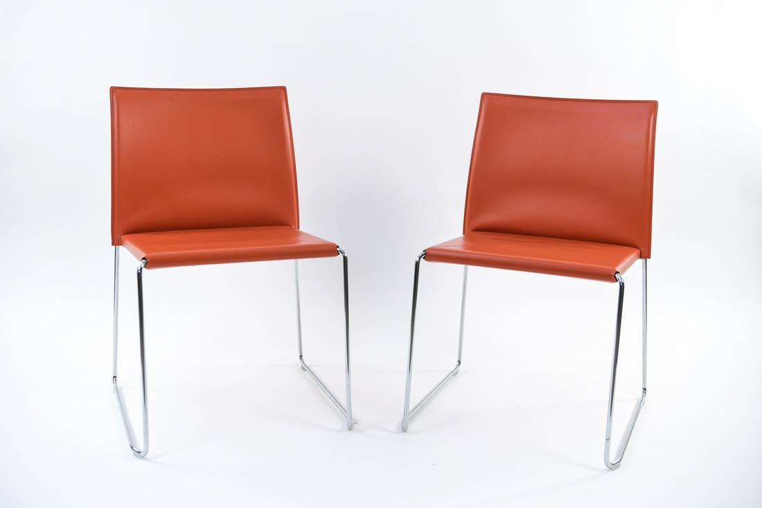 (2) FRANCO BIZZOZERO FOR ENRICO PELLIZZONI CHAIRS: Red. Tagged on back and bottom: Enrico Pellizzoni, Made in Italy. Model: Bizzy Chair. Dimensions: H 31.5" x W 18.5" x D 18.5" x SH 18" Condition: Minor surface scuffs and soiling to leather.