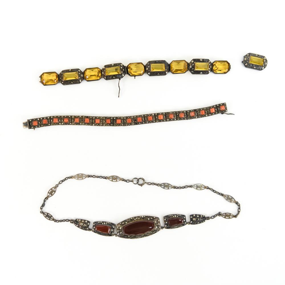 GROUPING OF ANTIQUE MARCASITE JEWELRY: Including coral, sterling and marcasite bracelet marked Germany, a carnelian, sterling and marcasite necklace and a stering, marcasite and yellow glass bracelet. Dimensions: L 6.75" x W 0.25" Conditio