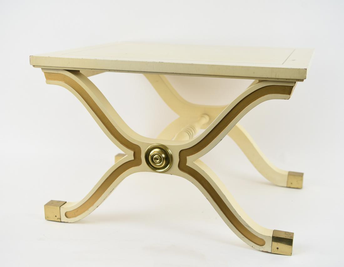 DOROTHY DRAPER HOLLYWOOD REGENCY SIDE TABLE: Dimensions: H 16.25" x W 24.25" x D 19.25" Condition: Some scratches, scuffs, gouges. Some tarnish to foot caps. Overall surface wear. Some paint loss.
