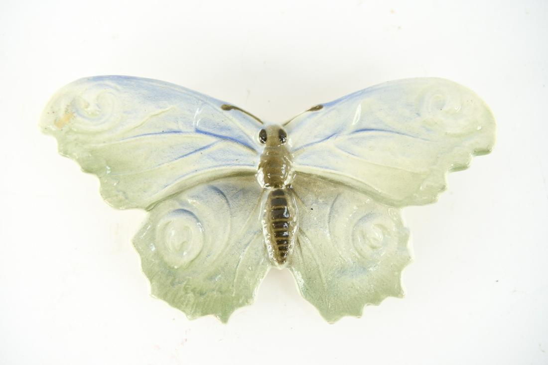 FRENCH MAJOLICA BUTTERFLY WALL POCKET: Keller Et Guerin Saint Clement mark to back. Dimensions: H 5" x W 9" x D 1.5" Condition: some crazing and minor age blemishes, small fracture near hanging hole, rub to front surface.