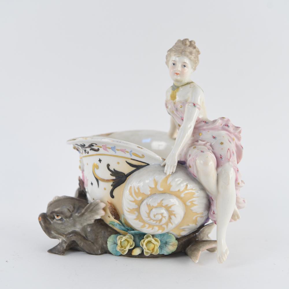 KPM PORCELIN GIRL ON CONCH SHELL BOWL: Marked underneath: KPM Dimensions: H 8" x W 4.75" x D 7.25" Condition: In need of restoration, repairs and missing pieces.