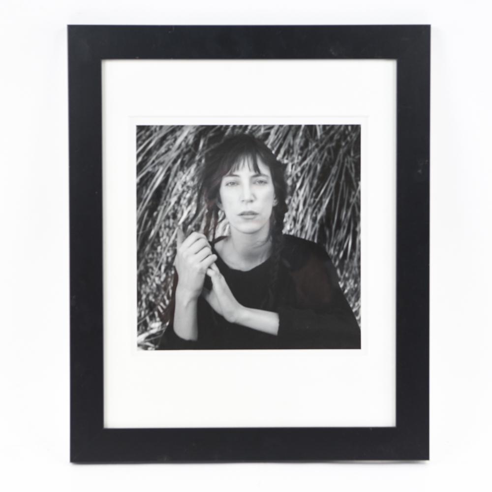 ROBERT MAPPELTHORPE (1946-1989): A production non-edition copy print photo used for the Patti Smith "Dream of Life" album cover which bears a signature and copyright 1987 date on the reverse. Signature not by Mappelthorpe's hand. Pho