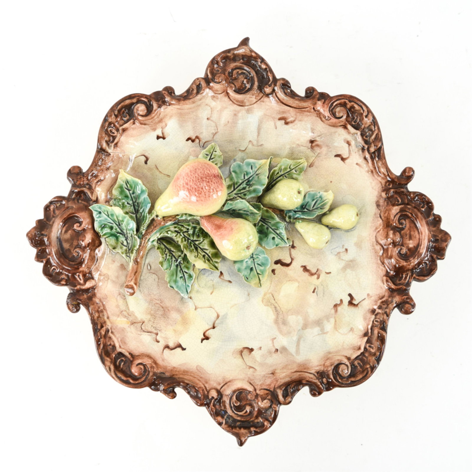 MAJOLICA PEAR WALL HANGING: With 1099 impressed on bottom and what appears to be a Minton date mark for 1891. Dimensions: H 2" x W 14.25" x D 14.25" Condition: age related crazing, small chips at edges of plate and leaves.