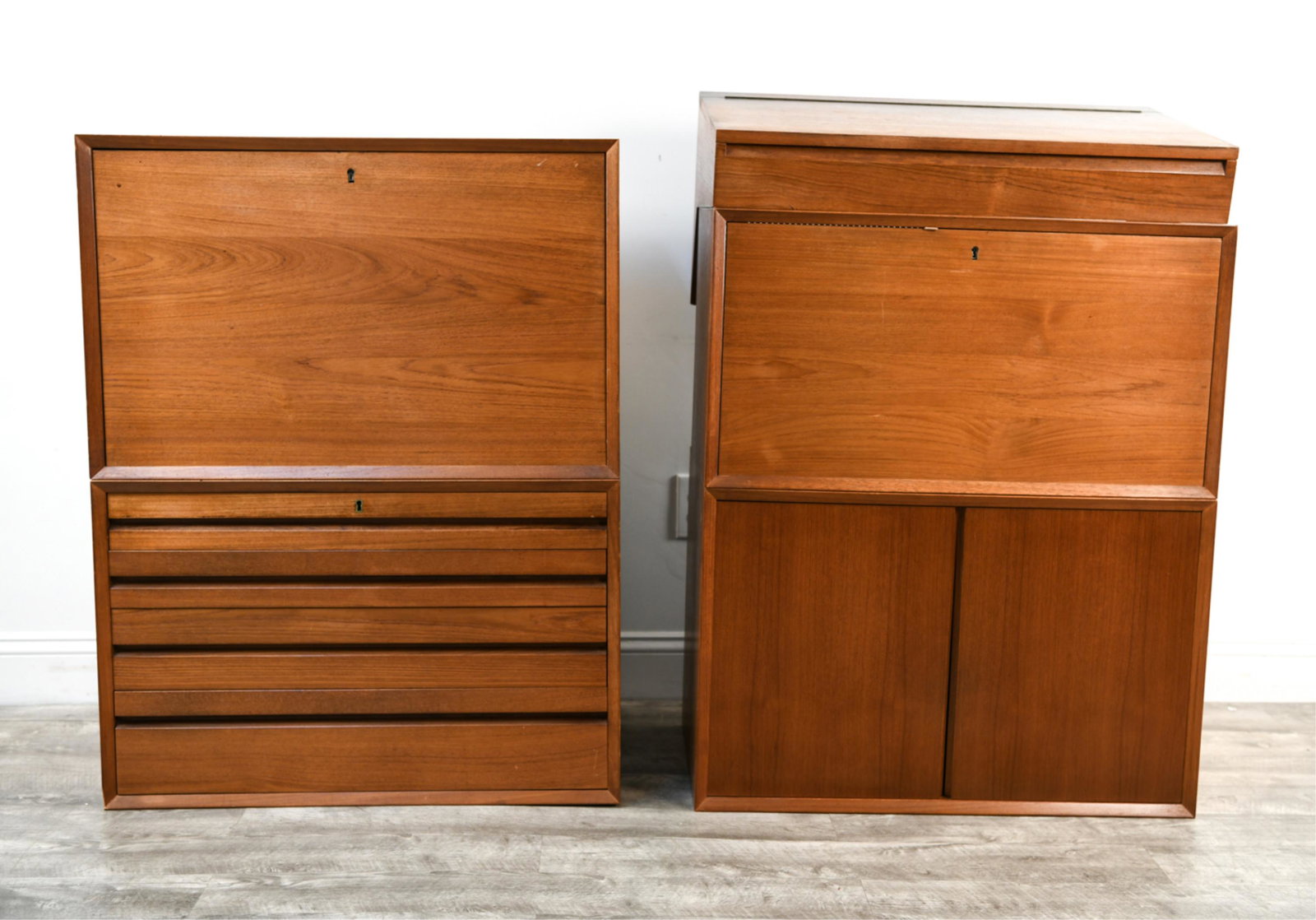 DANISH WALL UNIT CABINETS: (5) pieces. Drawered chest including working key.Dimensions: (Drawered chest) H 20.5" x W 31.5" x D 18"Condition: Showing signs of age and use throughout including finish loss, scratches, nicks, dings
