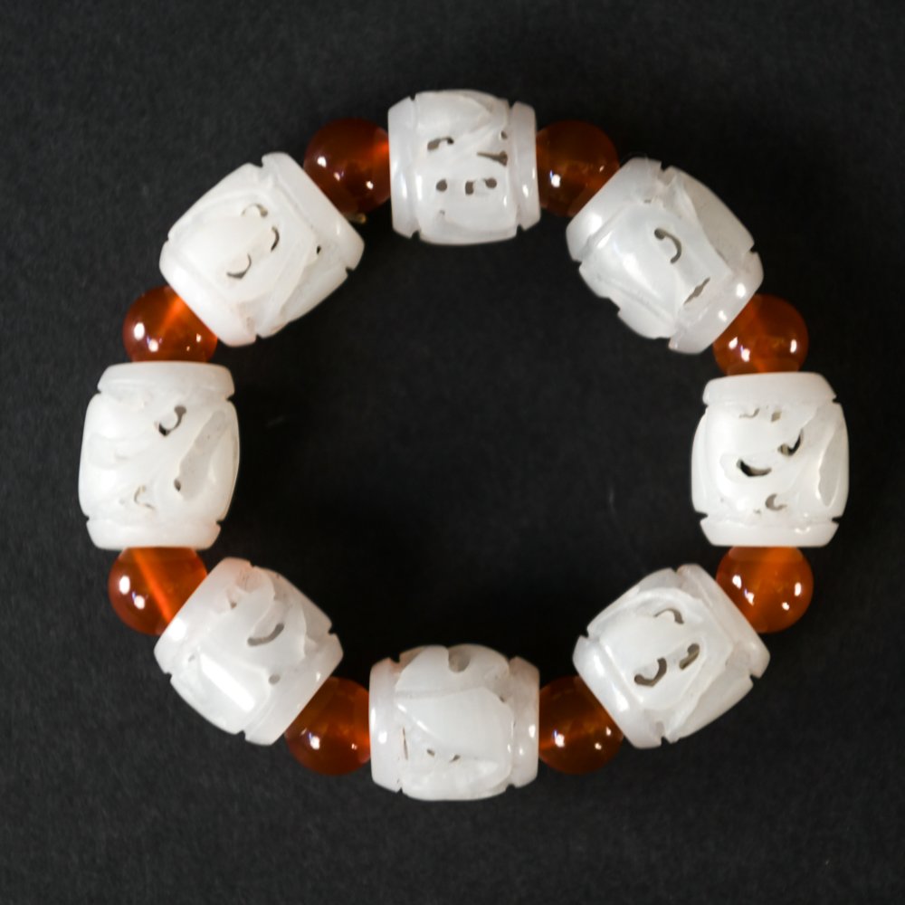 JADE AND CARNELIAN BRACELET: Dimensions: (Jade bead) D .5" Condition: Showing little signs of use.