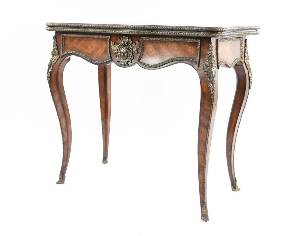 LOUIS XV STYLE MAHOGANY CARD TABLE: Althorp Louis XV style Mahogany and ormolu mounted card table. Dimensions: (Open) H 30" x W 35" x D 36.5" (Closed) H 30" X W 35.25" X D 18.25" Condition: Minor crack in one counter bowl, minor surface