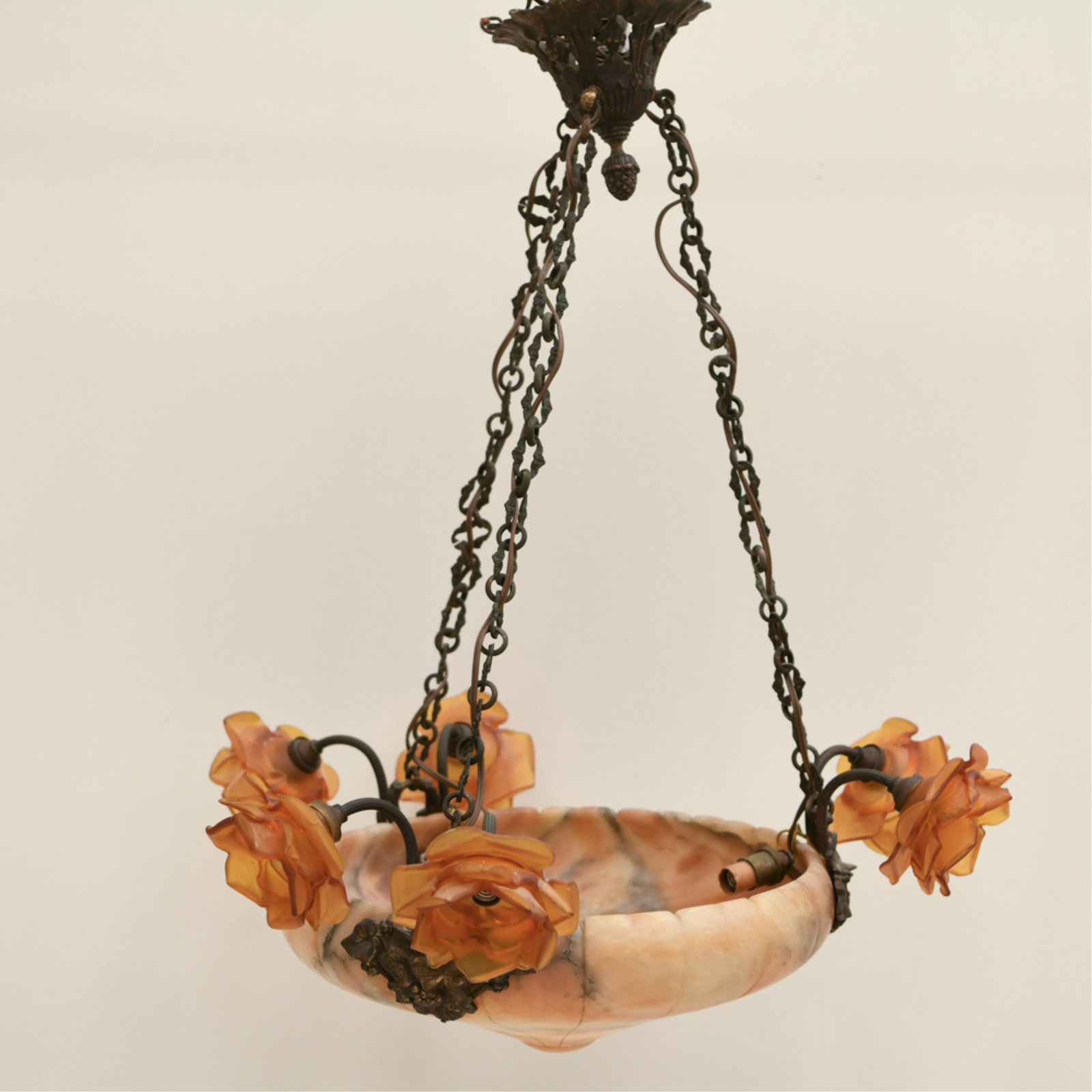 ANTIQUE BRONZE & ALABASTER CHANDELIER: With floral pattern glass shades. Bronze with floral pattern. c. 1910's/20s. In working order, not rewired. Includes two extra glass shades with wide fitters. Dimensions: (Alabaster bowl) H 8" x Dia. 