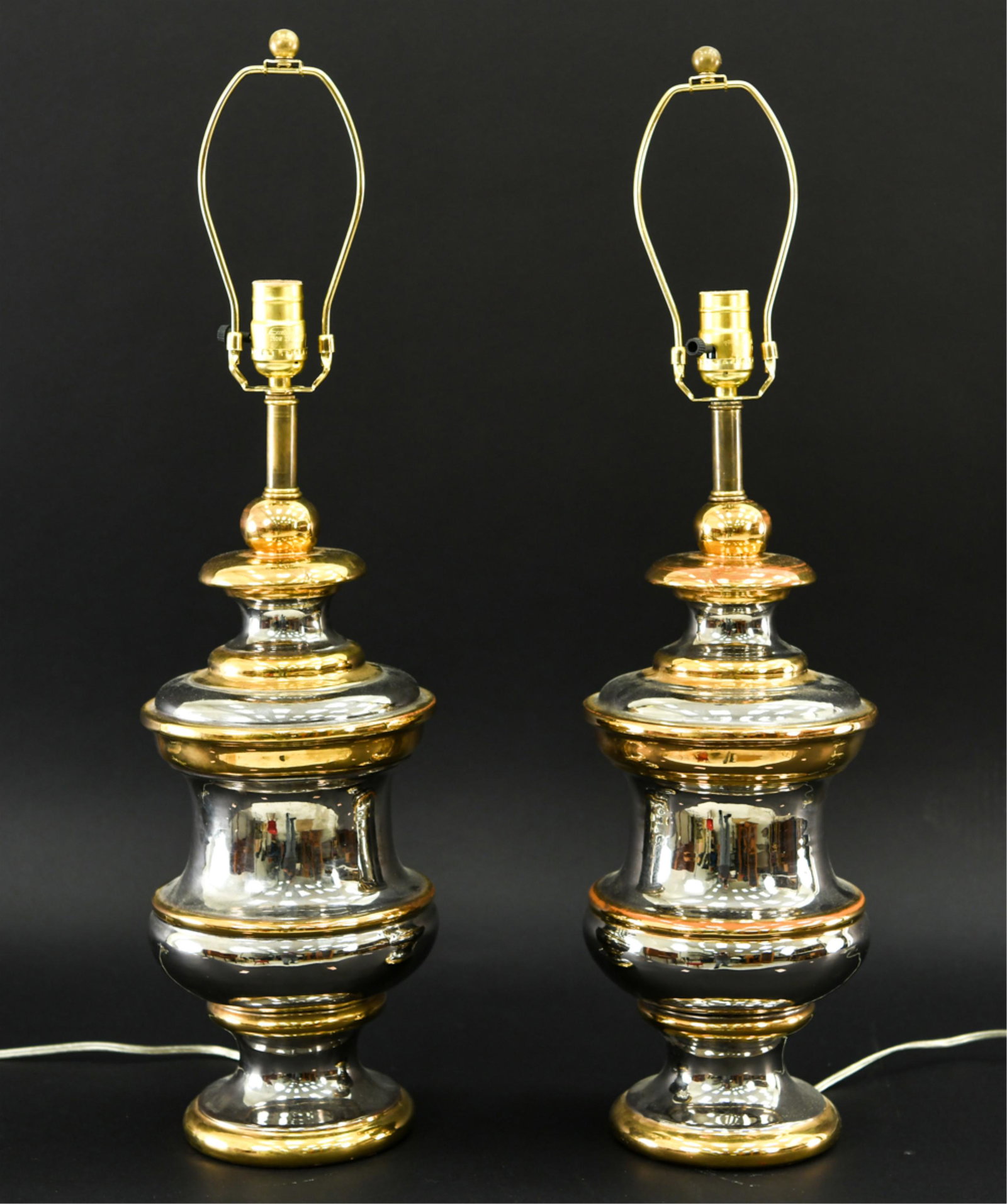 PAIR OF METALLIC GLAZE TERRA COTTA LAMPS: Possibly Italian. Rewired, new fixture mounts. Dimensions: (To socket) H 22" x D 7.25" Condition: Couple small nicks to glaze including an area with some glaze loss to one lamp.