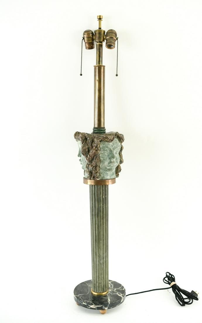 MID-CENTURY SCULPTURAL FACE LAMP: Marble (Base), wood (Column) , ceramic (Faces), and brass (Lamp stalk). Marked made in Italy to marble underneath. Dimensions: (To socket) H 40" x D 7.5" Condition: Few small chips and nicks to face(s