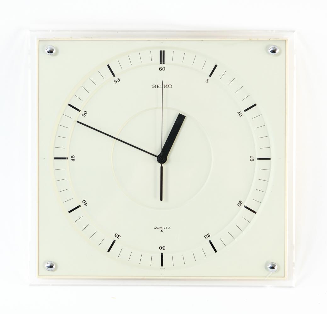SEIKO WALL CLOCK, C. 1970: Marked Seiko to face. Dimensions: H 10.25" x W 10.5" Condition: Small crack by one screw. Not tested.