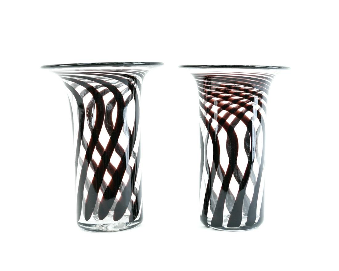 PAIR OF ANTHONY STEARN TRUMPET GLASS VASES: British, Anthony Stearn. Signed underneath. Purple and clear swirled art glass. Dimensions: H 12.5" x Dia. 9.5" Condition: No issues to note.