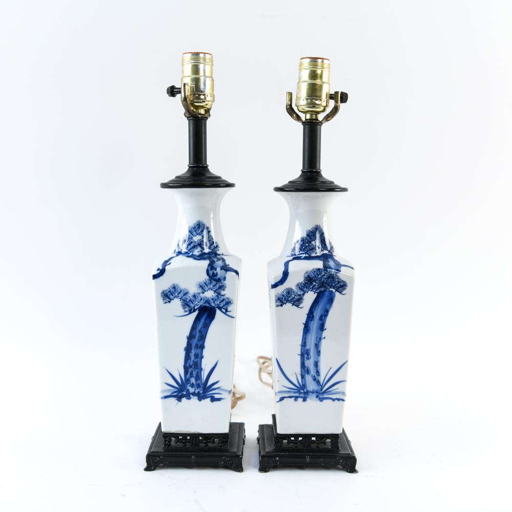 PAIR OF CHINESE BLUE AND WHITE PORCELAIN LAMPS: Dimensions: H 17" x W 4" x D 4" Condition: Minor surface wear.