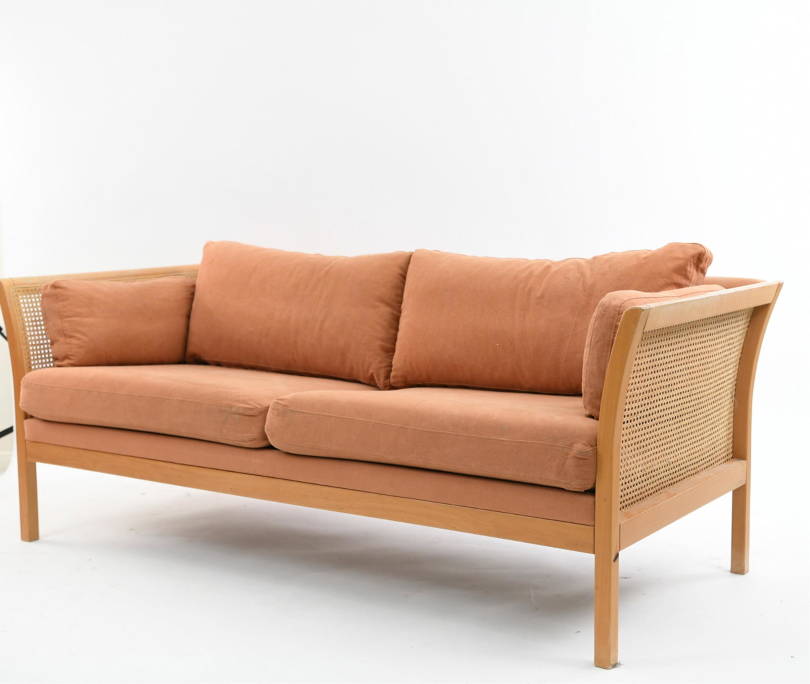 DANISH MID-CENTURY 2-SEATER SOFA: Dimensions: H 27" x W 72" x D 31" x SH 18" Condition: Fading and staining to wood. One burn spot on front left leg. Pilling to back upholstery. H188