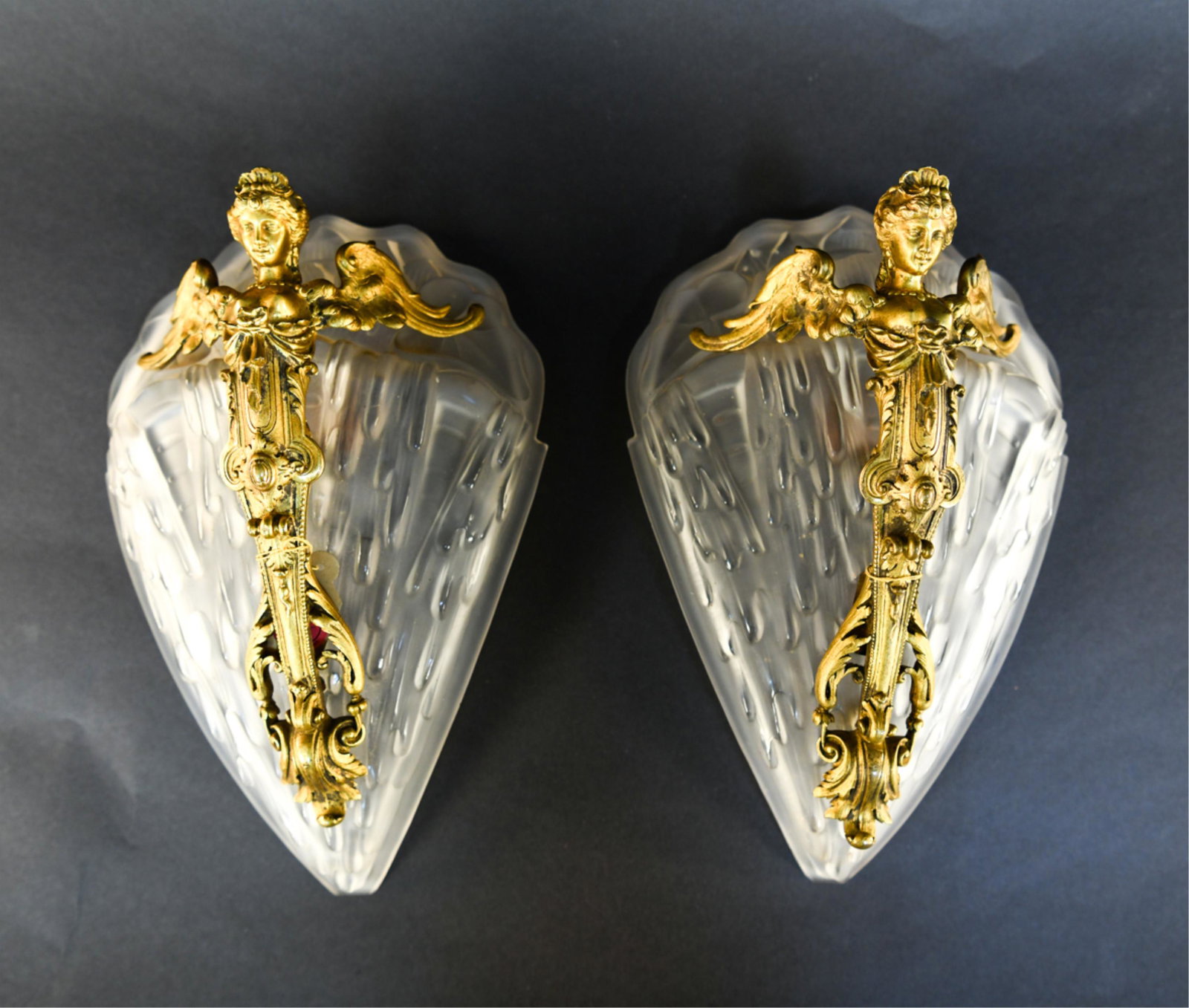 PAIR FRENCH DORE BRONZE & GLASS SCONCES: With Sotheby's Auction label on back. Dimensions: H 12" x W 7.5" Condition: One with chip to bottom edge. Few minor chips and flea bites to edges.