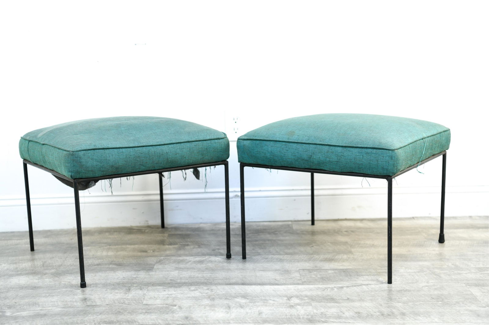 (2) PAUL MCCOBB PLANNER GROUP IRON STOOLS BENCHES: Dimensions: H 17" x W 21" x D 21" Condition: Stains, fading and fraying to upholstery. Some leg caps missing.