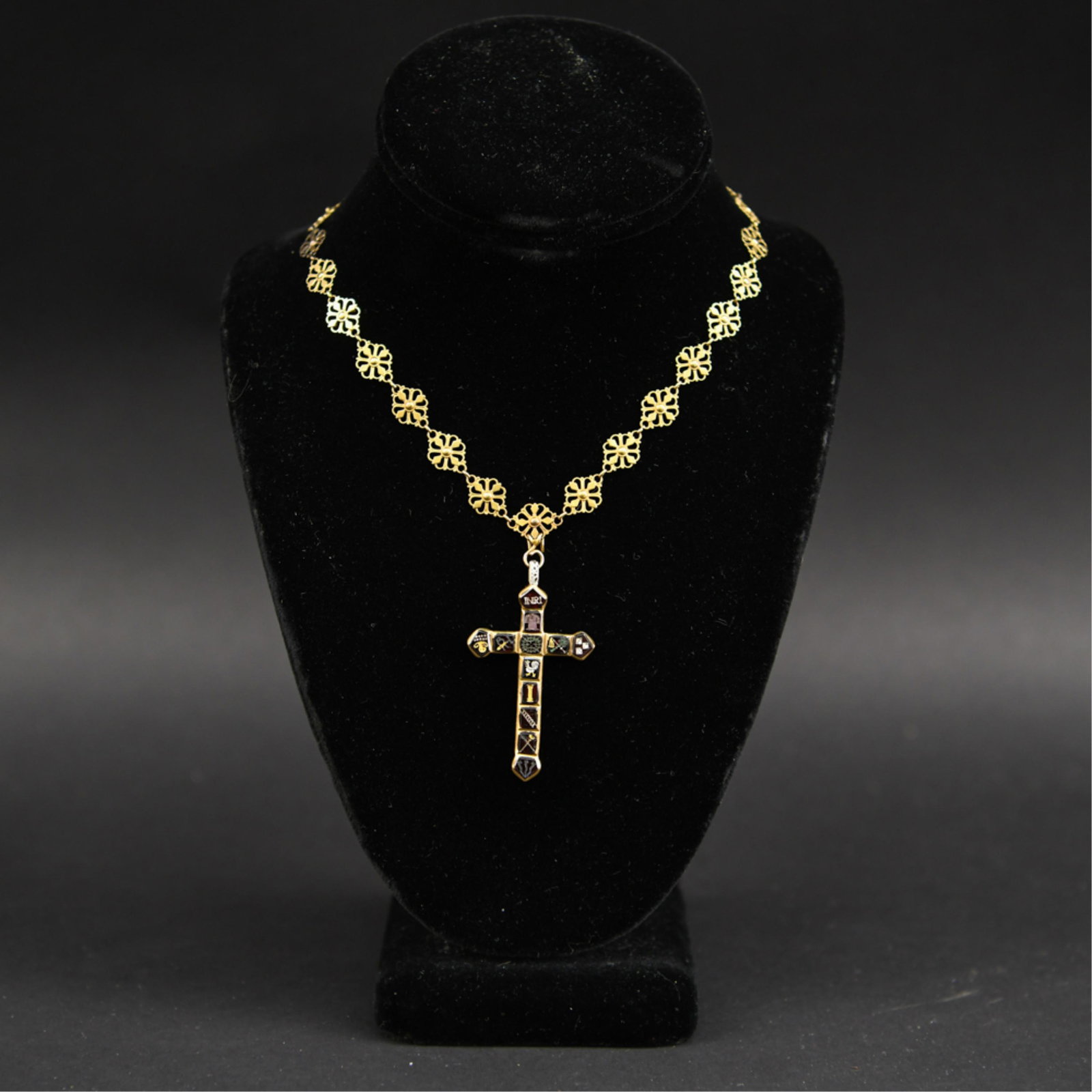 ANTIQUE SPANISH ENAMEL & GOLD CROSS: Gold unmarked, necklace tests for 18k, cross for 14k. Inset red glass with incised design and coloring. Loop and back with enamel floral design and Maria. With gold tone floral form 18k gold chain. Di
