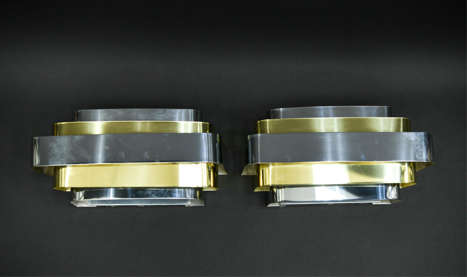 PAIR OF LIGHTOLIER BRASS AND CHROME SCONCES: Dimensions: H 7" x W 14"x D 5.5" Condition: Showing light signs of use and handling including finish wear to some edges and light scratches.