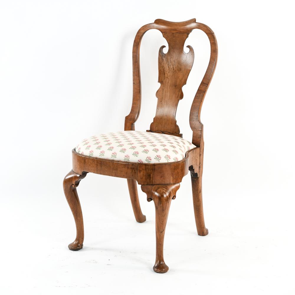 18TH C. QUEEN ANNE COMPASS SEAT SIDE CHAIR: Walnut chair, decorative back splat. Dimensions: H 40.5" x W 22" x D 22" x SH 20" Condition: Some splits in the wood. Surface stripped.