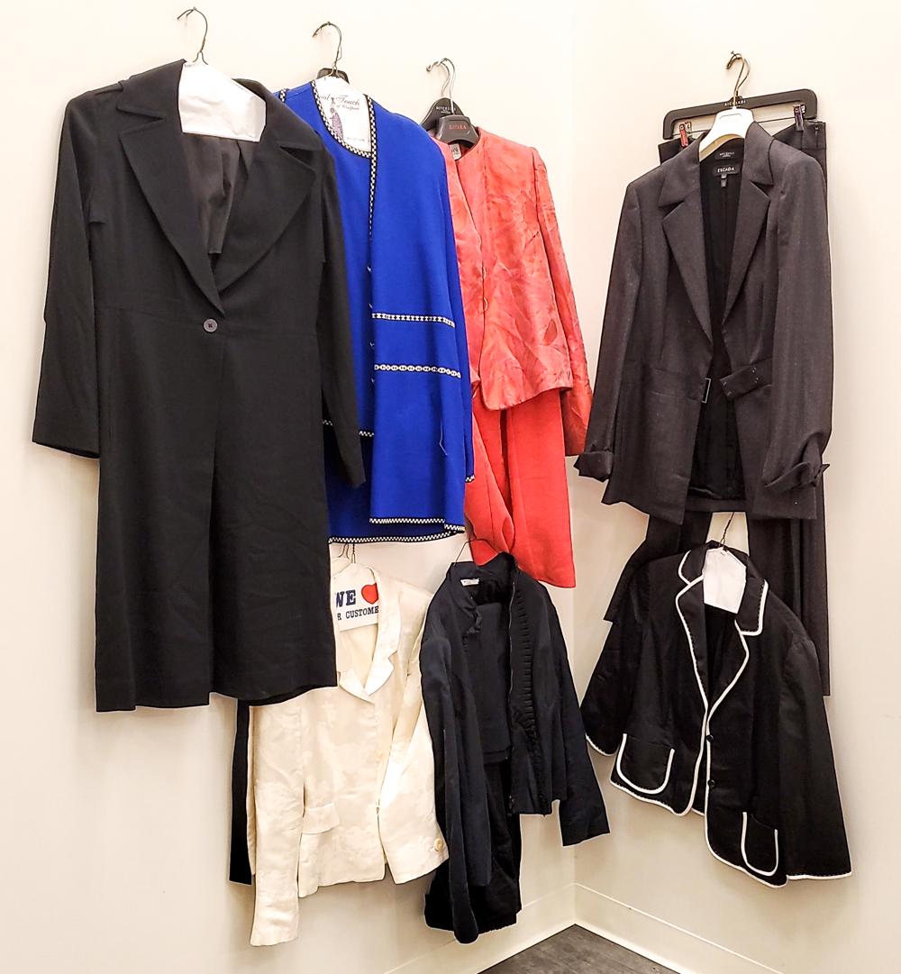 GROUPING OF LADIES DESIGNER SUITS & BLAZERS: Including a few two piece suits. Brands include: Escada, Armani, R Label, Escada Sport, Escada Margaretha Ley, etc. Size: 40-46 Condition: Used, showing light signs of use.