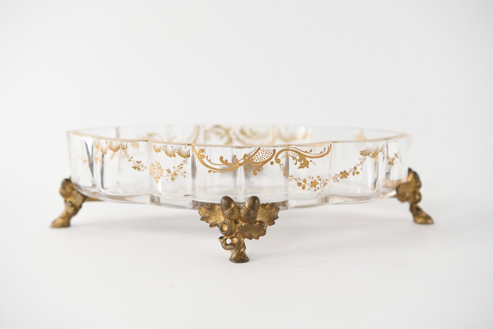 BACCARAT GLASS & ORMOLU DRESSER DISH: Base marked. With acorn and hoof motif base. Dimensions: H 2.75" x W 11" x D 6.75" Condition: Patina to brass.