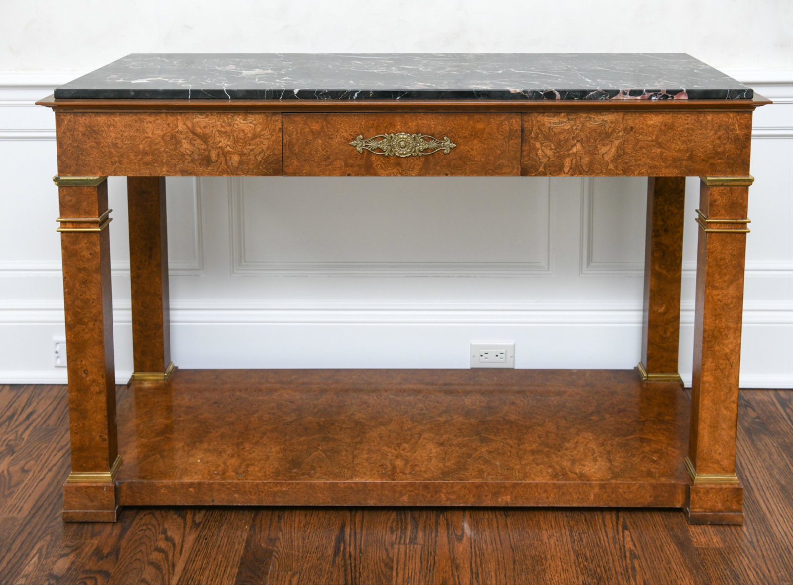 BAKER BURL VENEER & MARBLE CONSOLE: Tagged inside drawer. With brass details. In neoclassical style. Dimensions: H 35" x W 54" x D 18" Condition: One or two small edge nicks.