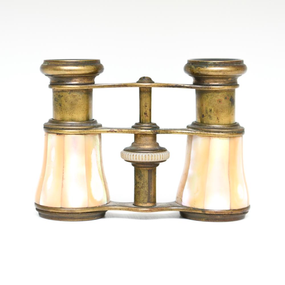 ANTIQUE BRASS & MOTHER OF PEARL OPERA GLASSES: Marked: Treuer Berlin. Focusing mechanism works. Dimensions: H 2.75" x W 3.75" x D 1.5" Condition: Some age toning to brass.