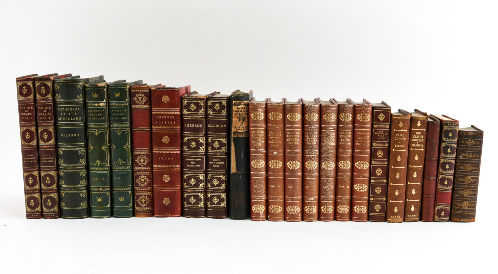 GROUPING OF LEATHER BOUND BOOKS: Including The Life of Cellini, Vol. 1 & 2, Anthony Adverse, Mad Man's Drum, The Essays of Elia, and more. Dimensions: (Linear feet) L 2', 5" Condition: Showing wear consistent with age and handling. W