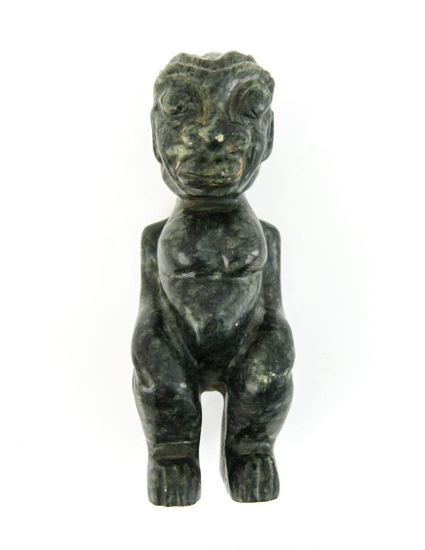 VINTAGE GREEN STONE FIGURE: Dimensions: approximately 9" in height. Condition: Minor edge nicks.
