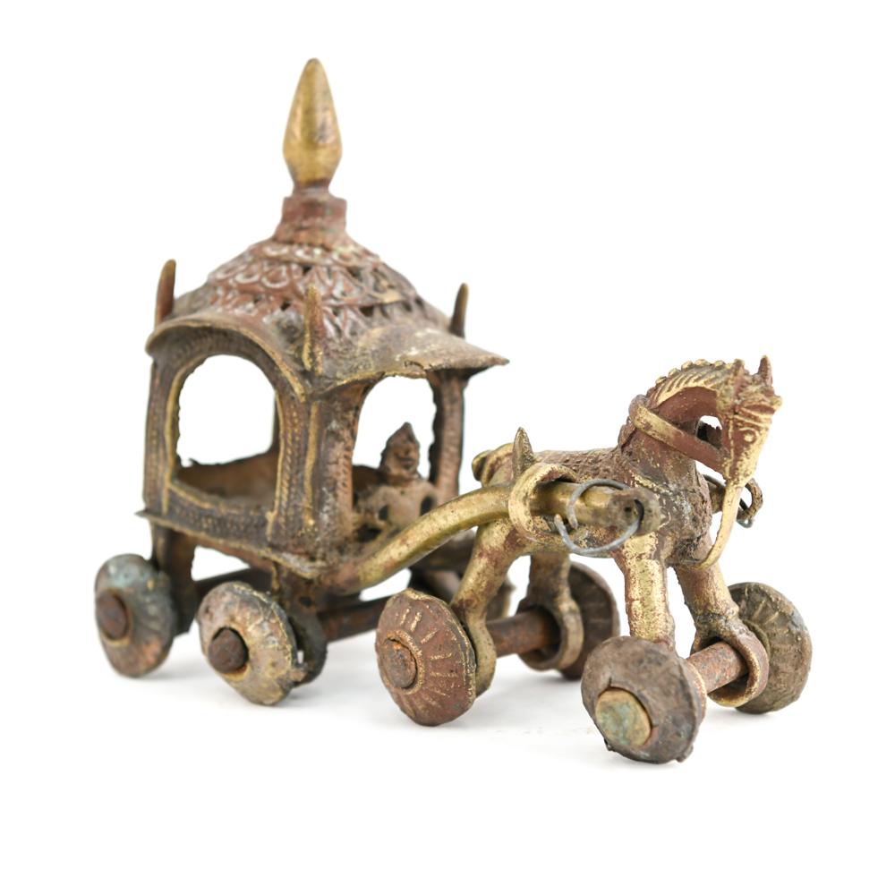 INDIAN BRASS TEMPLE TOY: Horse and carriage. Retains some paint. Dimensions: H 8.75" x W 7.5" x D 4" Condition: Handling wear consistent with age. Rings at ends of horse cart not original.