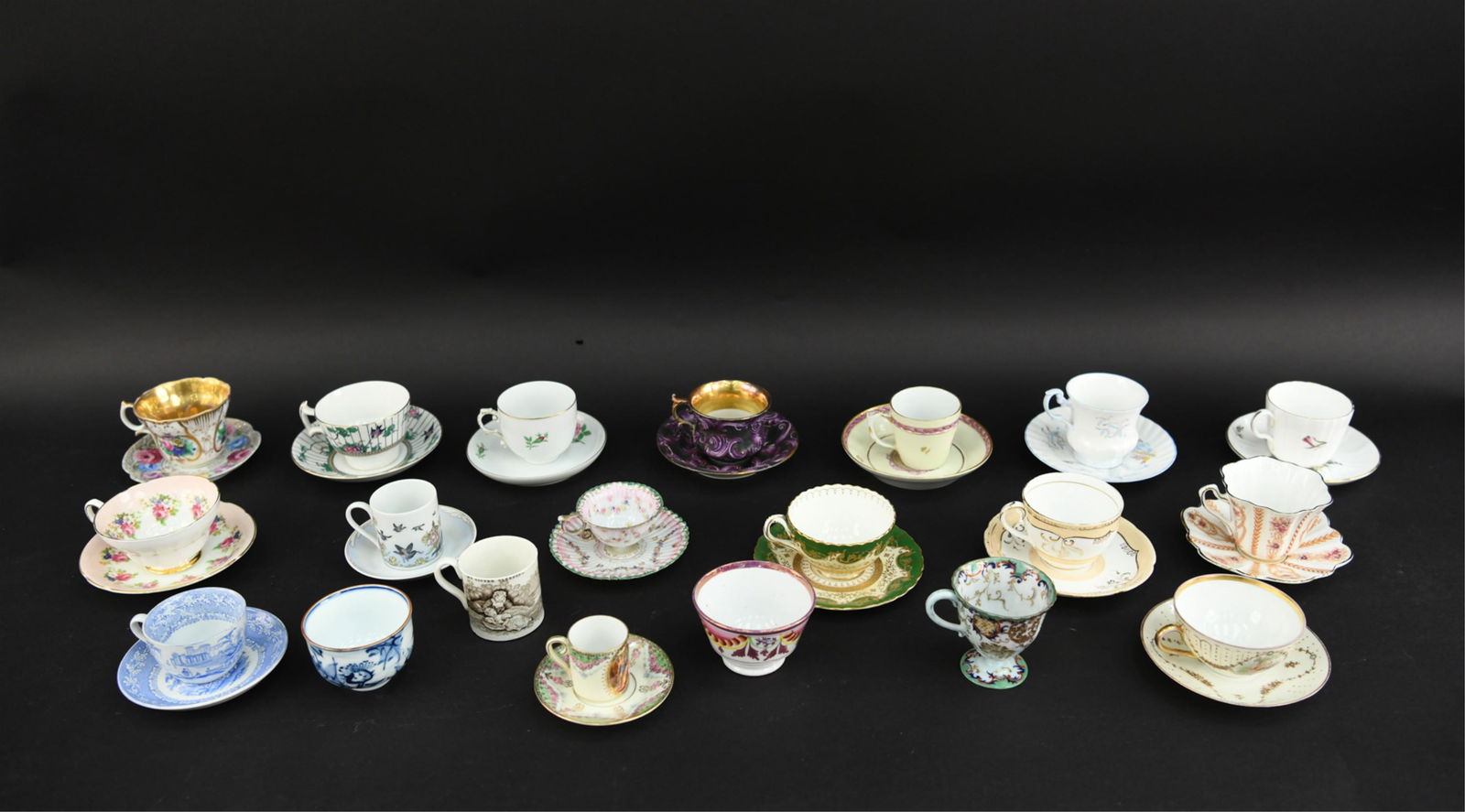 COLLECTION OF PORCELAIN TEA CUPS: Tea cups and saucers. Names like Stanley, West Germany, Delecta, Desden, Hutchenreuther, Booths, Vincennes France, Rosina, etc. Dimensions: Largest: H 3" x Dia: 6" Condition: Showing minor signs of ag