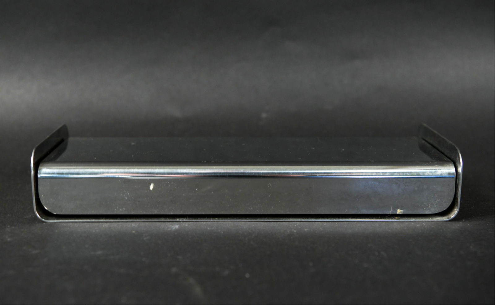 CITERA BOX BY ENZO MARI FOR DANESE MILANO: Labeled on bottom; Danese Milano. Made in Italy. Enzo Mari 1960. Dimensions: H 2" x W 12" x D 4.75" Condition: Wear from use including surface scratches.