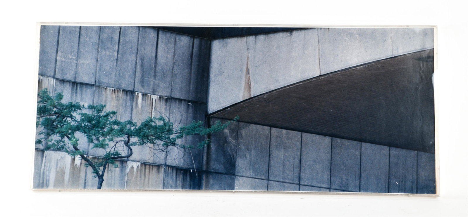 ACRYLIC FRAMED BRUTALIST STRUCTURE PHOTOGRAPH: H 58.5’’ x W 24.5’’ Condition Losses to edges, scuffs, scratches to plexiglass.