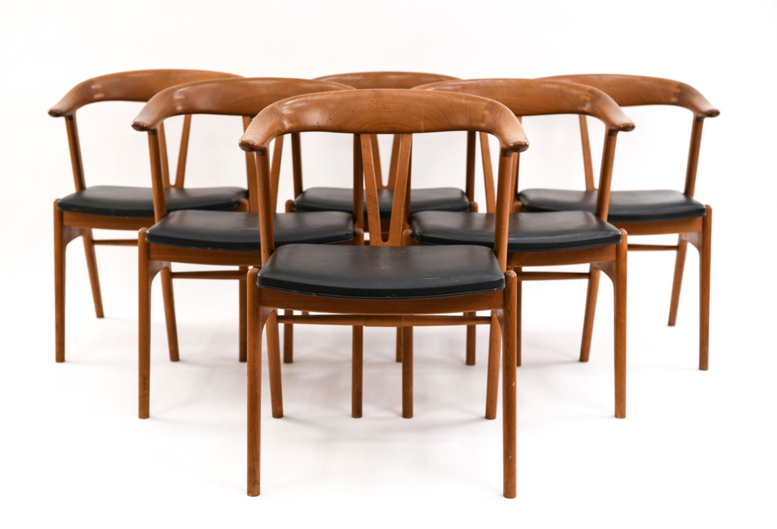 (6) SOREN GEORG JENSEN DANISH TEAK DINING CHAIRS: Tagged under seats. Dimensions: H 30" x W 22" x D 20.5" x SH 17" Condition: Wear to leather consistent with age and use. Some old repairs with some separation to joints.