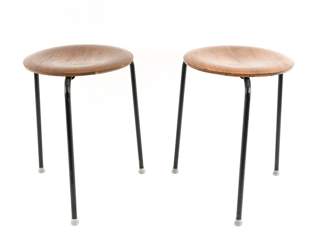 ARNE JACOBSON FOR FRITZ HANSEN DOT STOOLS: A great pair of minimalist stools ready to help you and a friend take a load off, while also able to be easily stored when not in use. Marked Made in Denmark under. Dimensions: H 18 in. x Dm 15 in. Co