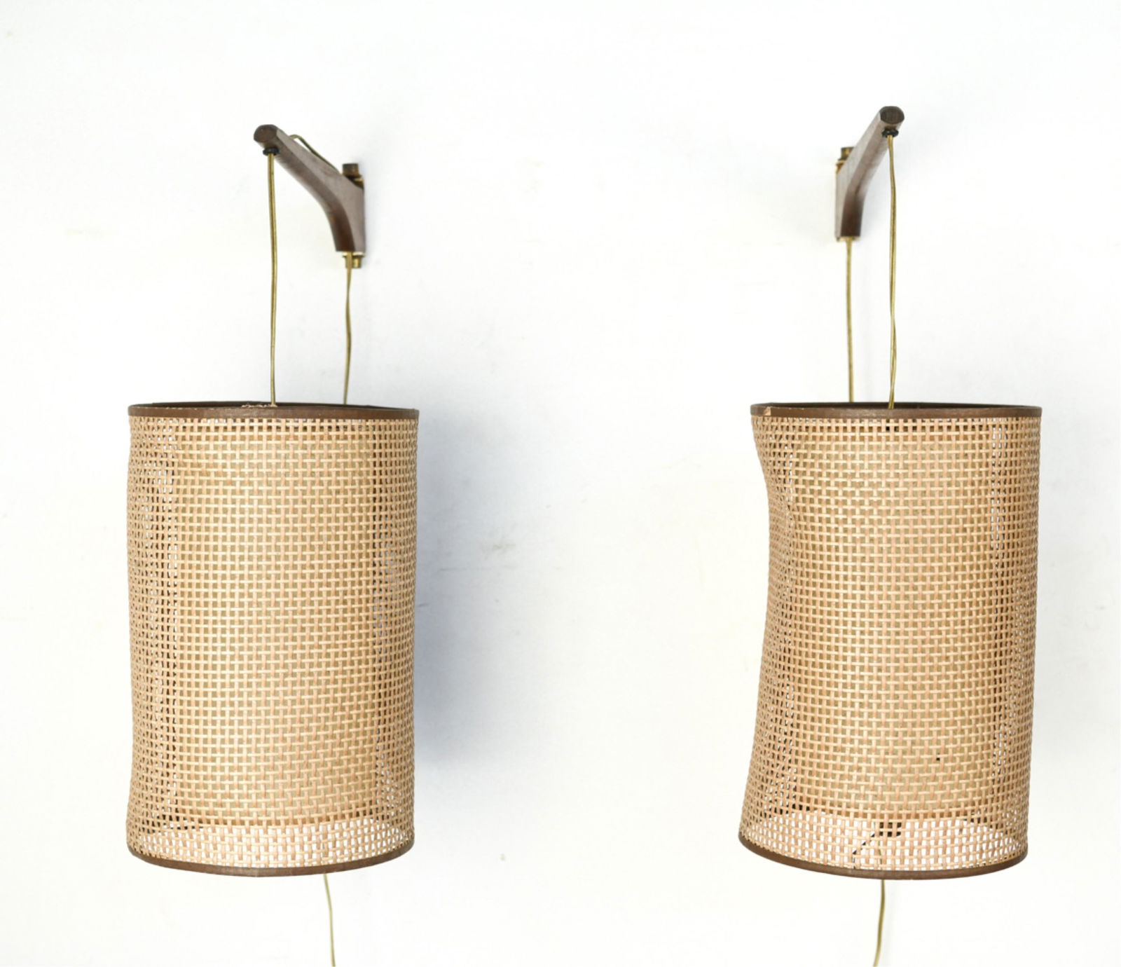 MID-CENTURY CANED SHADE SCONCES: Dimensions: H 14" x Dia. 9.5" Condition: Some warping to caning. Scratches and fading to shades.