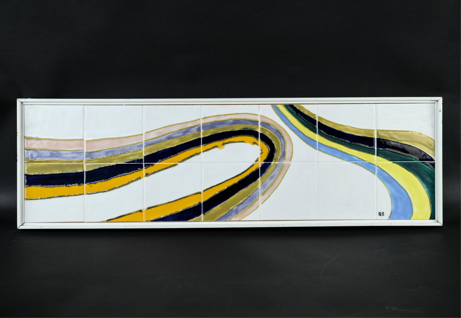 MID-CENTURY TILE ART WALL SCULPTURE: Initialed G.S. Mounted on particle board. Titled Ribbon verso. Dimensions: (Frame) H 13.25" x W 43.5" Condition: Rubbing to frame. A few light surface marks to tiles.