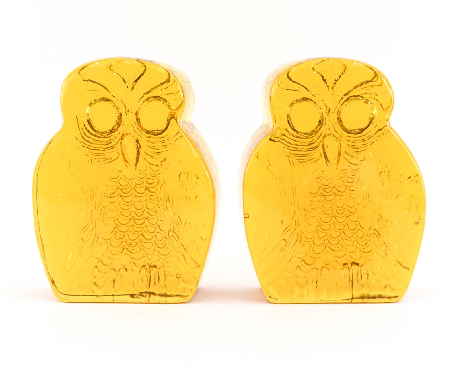 BLENKO AMBER GLASS OWL BOOKENDS: Dimensions: H 7" x W 5" x D 2" Condition: Couple small inclusions from the making.