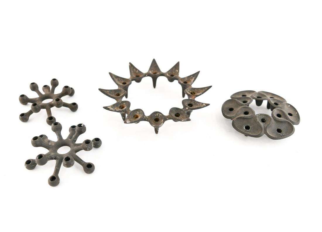 JENS QUISTGAARD FOR DANSK CANDLEHOLDER GROUPING: Most marked, including some original Mfg. boxes. Dimensions: (Largest) H 1.5" x D 7.25" Condition: Showing some signs of use.