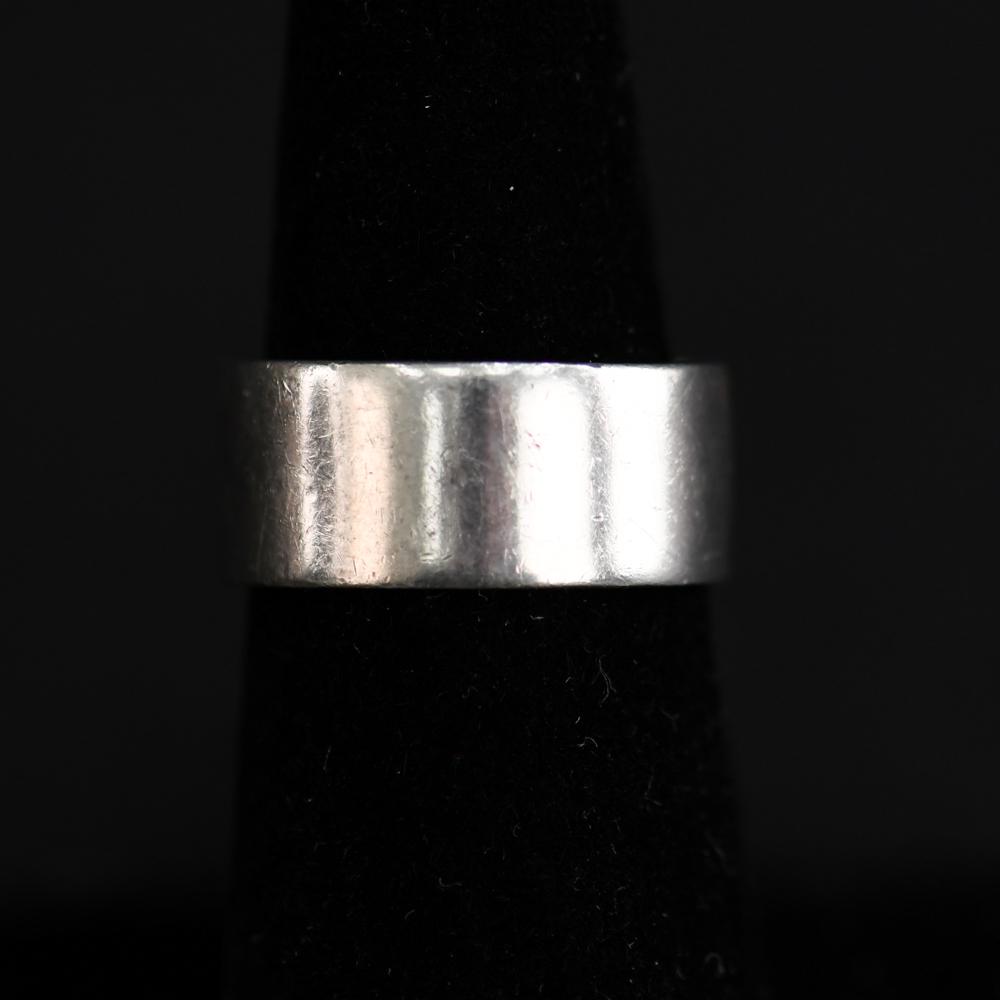 BENT KNUDSEN DANISH STERLING SILVER WIDE BAND: Hallmarked sterling, Denmark, Bent K 212. Dimensions: W 0.25" Ring Size: 7.5 Condition: Showing light signs of use.