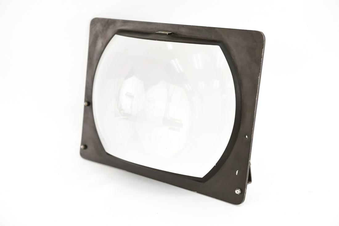 VINTAGE MID-CENTURY TELEVISION MAGNIFIER: Walco Tele-vue lens. Dimensions: H 10" x W 13.25" x D 3" Condition: Some scratches, may be missing some hardware