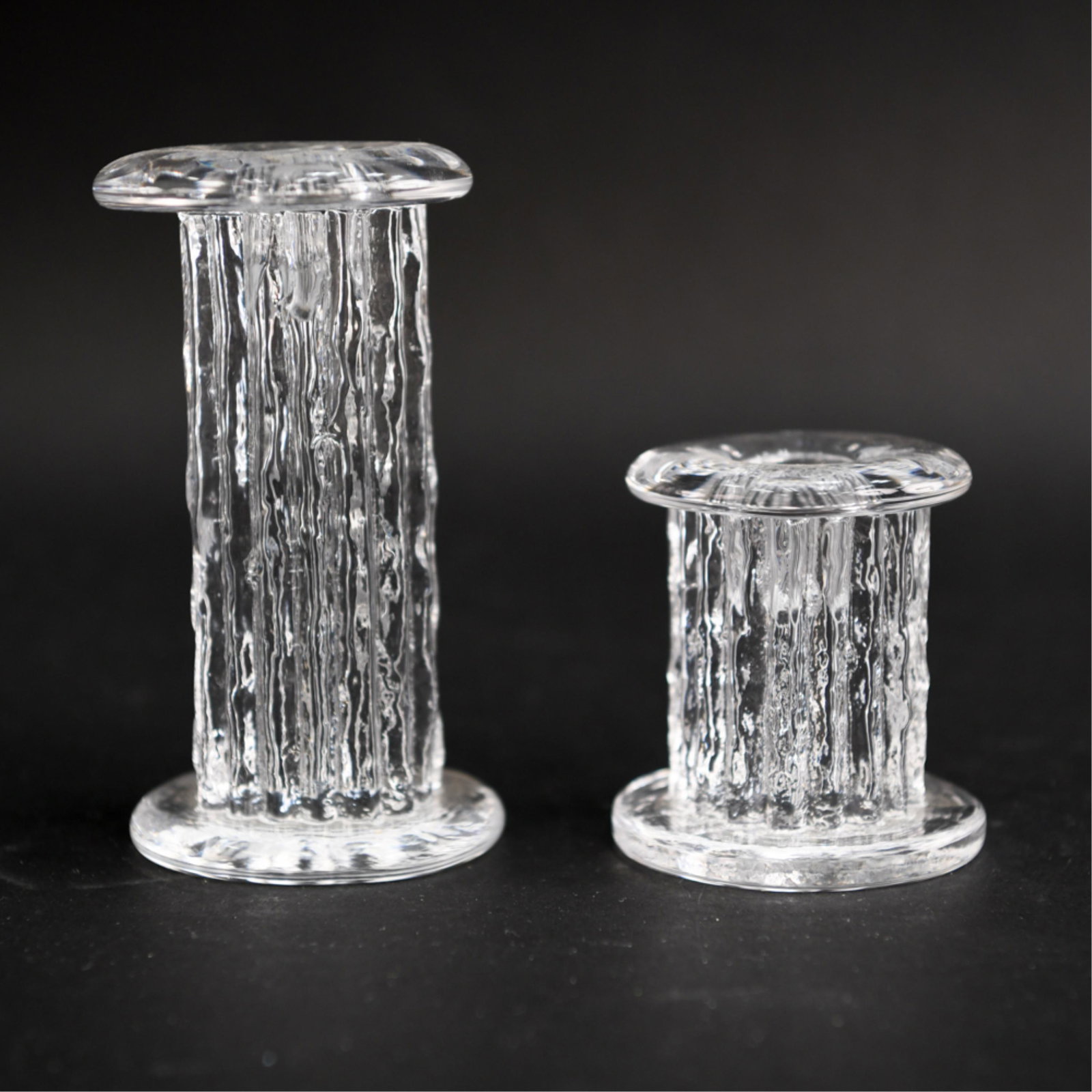 MID-CENTURY SCANDINAVIAN FLUTED GLASS CANDLESTICKS: Unsigned. Dimensions: (Taller) H 5.75" x D 3" Condition: No issues to note.