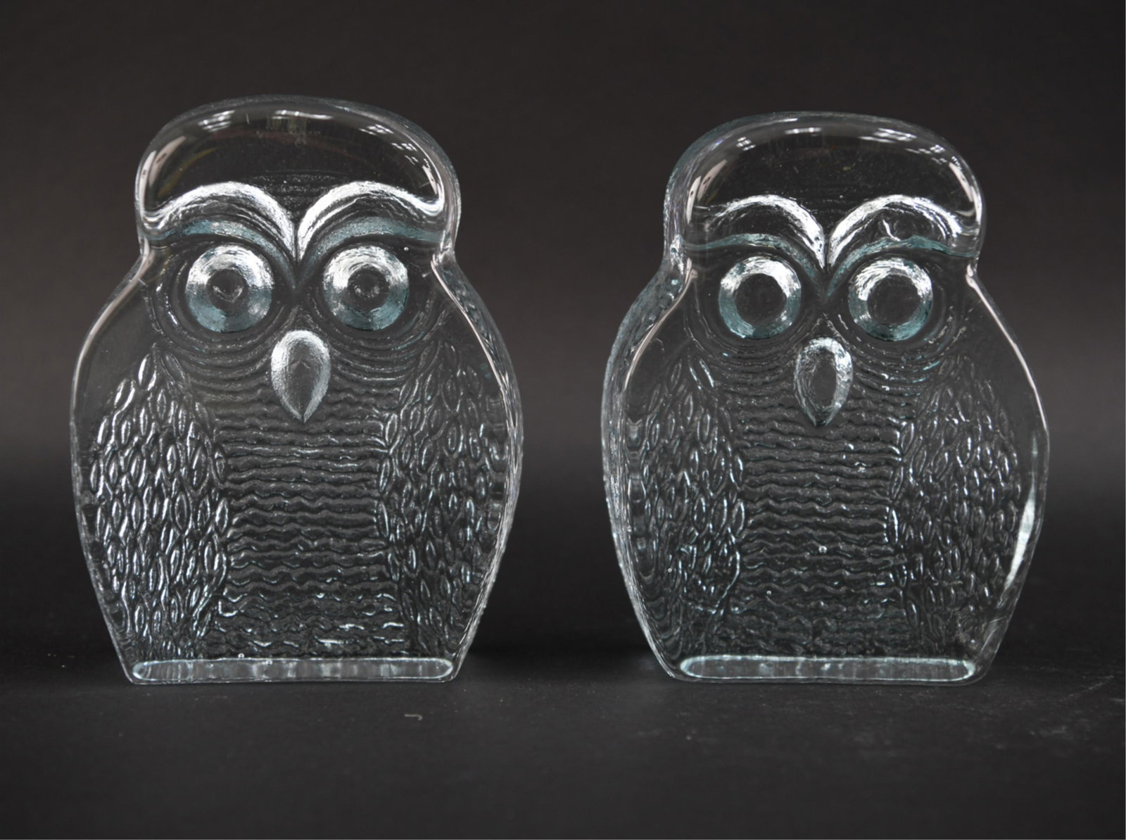 PAIR OF BLENKO ART GLASS OWL FORM BOOKENDS: Unsigned. Dimensions: H 7" x W 5.5" x D 1.75" Condition: Light rubs to some edges.