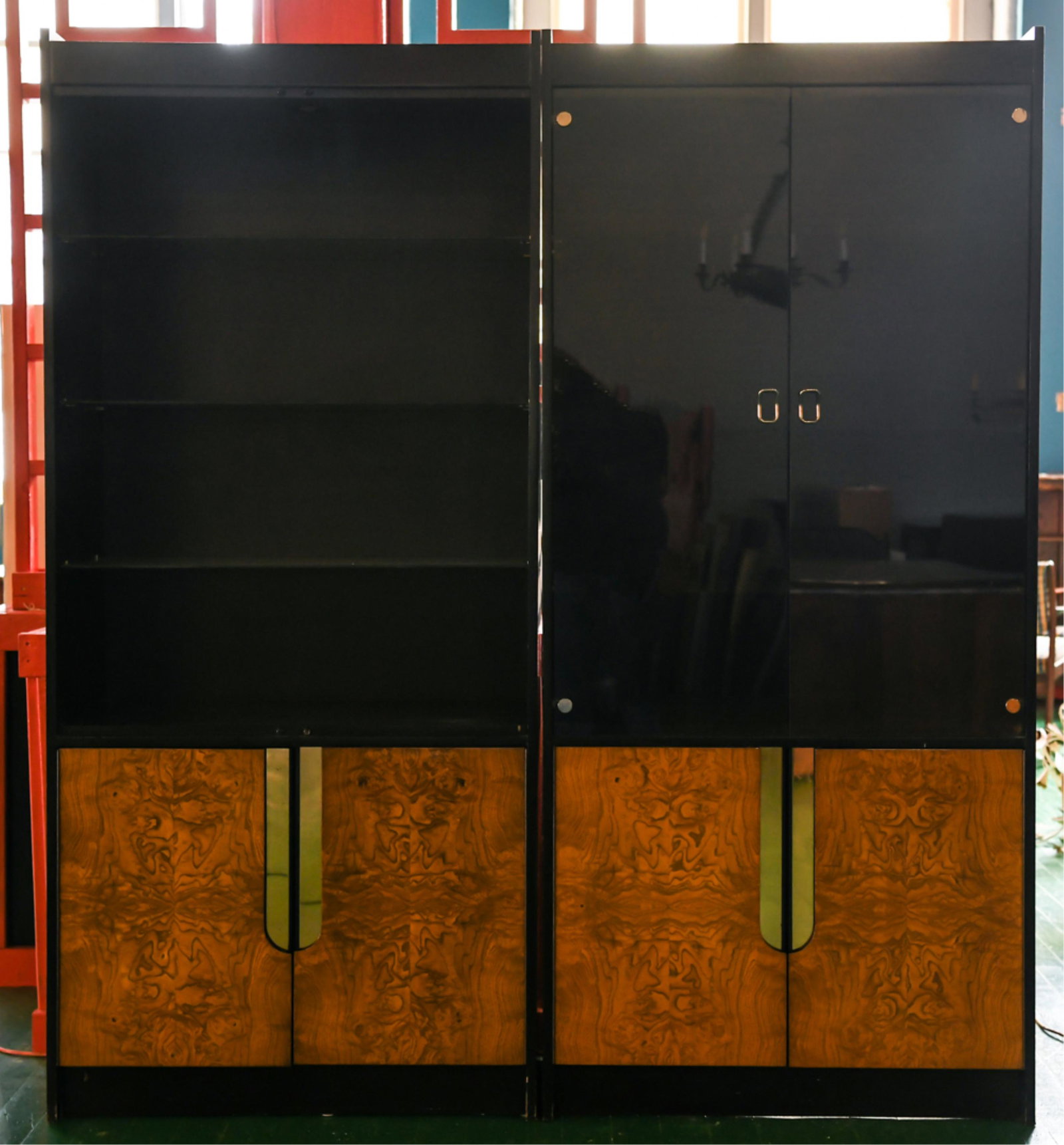 PAIR OF BLACK LACQUER AND BURL DISPLAY CABINETS: Milo Baughman style. Dimensions: H 79.5" x W 36" x D 18" Condition: Doors on second cabinet need to be reattached, minor signs of use and age.