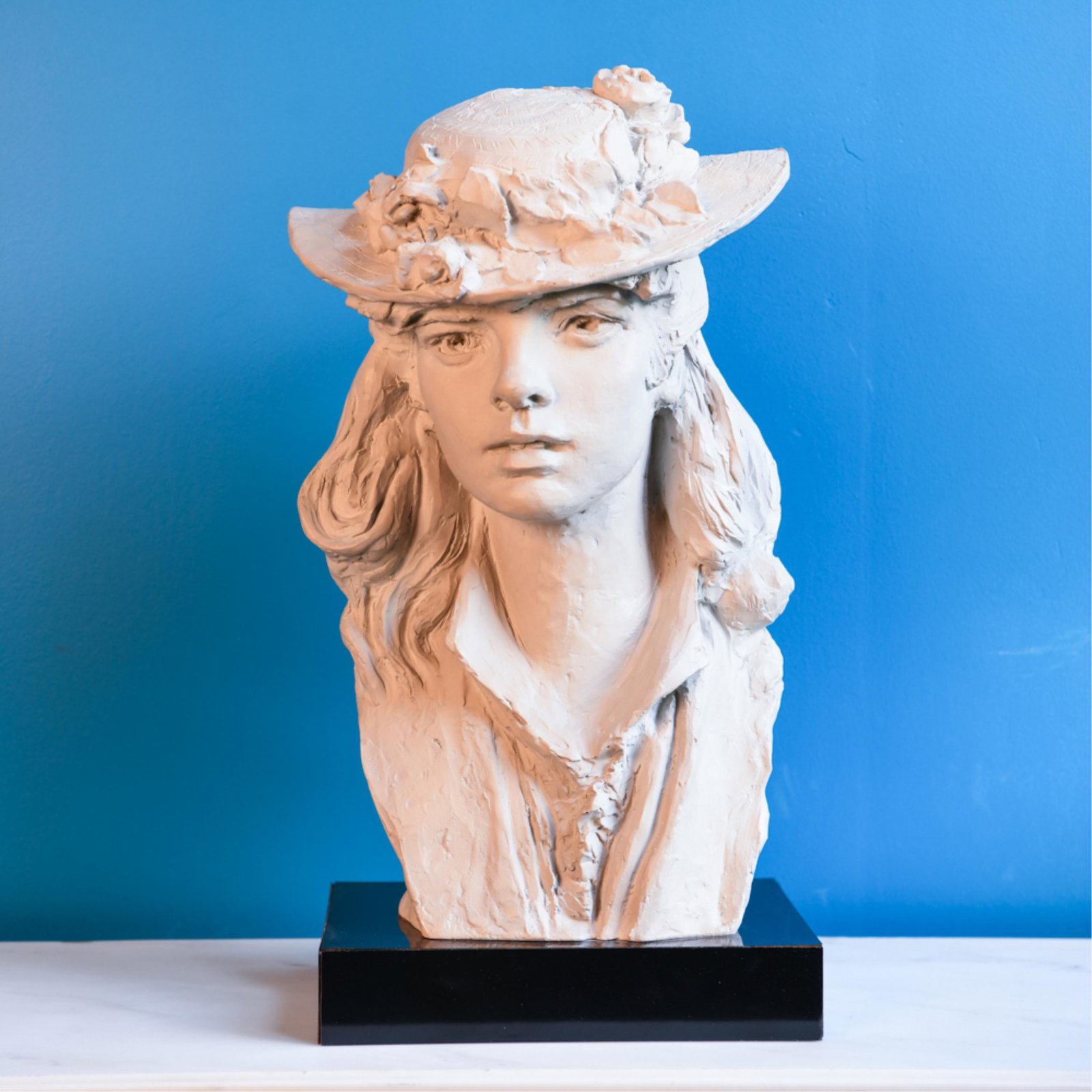 AUSTIN PROD PLASTER FEMALE BUST SCULPTURE: Signed and dated 1979. Dimensions: H 21" x W 11" x D 7.5" Condition: Some small losses.