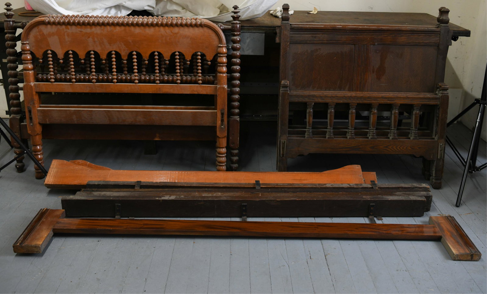 GROUPING OF WOOD BED FRAMES: Dimensions: (Full headboard) H 42" x W 56" x D 2.5" Condition: 3 twin beds appear to be complete. Scratches,losses to finish and surface dirt.