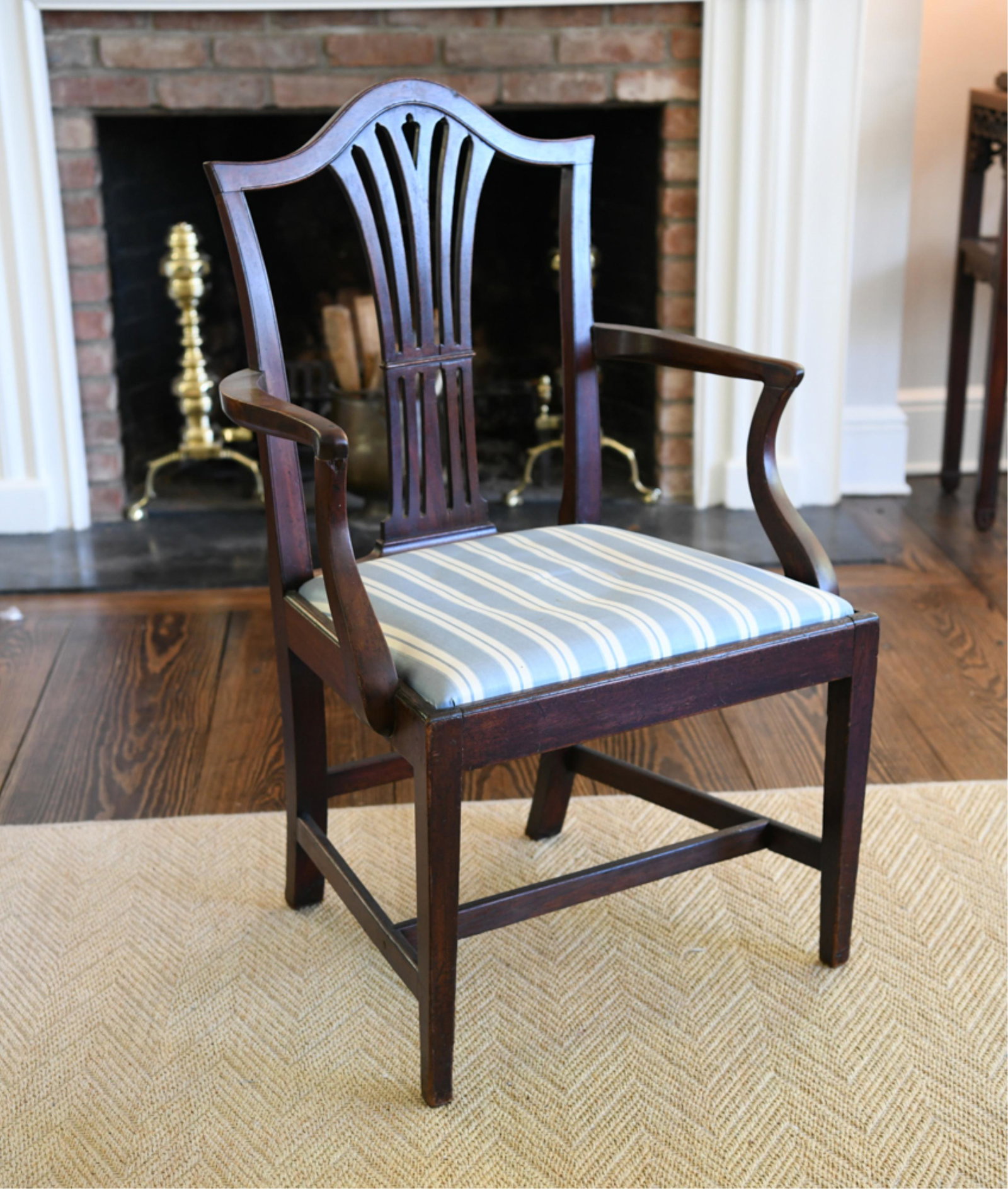 ANTIQUE CHIPPENDALE STYLE ARMCHAIR: Mahogany. 19th century. Dimensions: H 38" x W 24.5" x D 21" x SH 18" Condition: Little wear to edges, seat with stains.