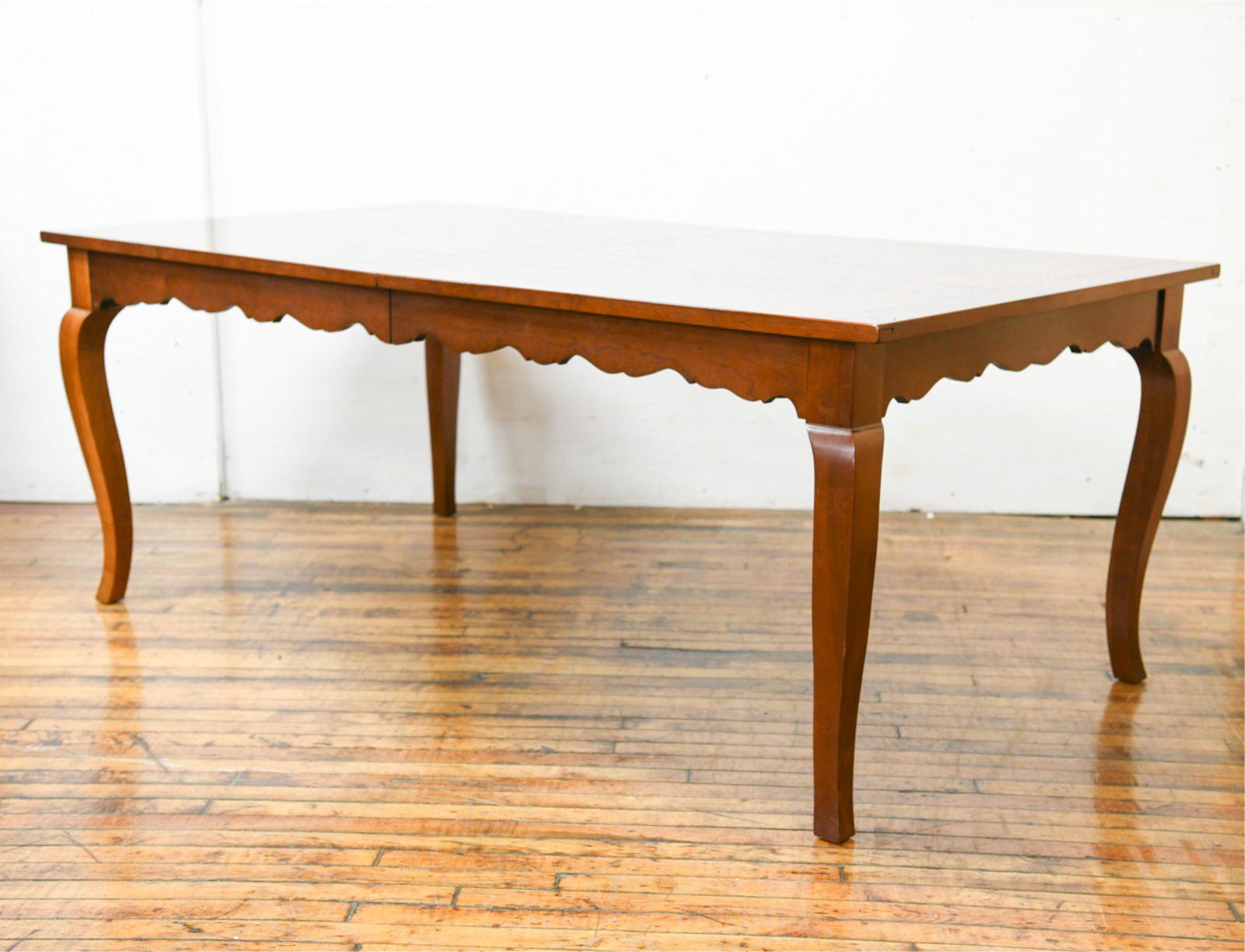 FRENCH COUNTRY STYLE DINING TABLE: Dimensions: H 30.5" x W 126.75" x D 41.75" Condition: Minor nicks and scratches to legs, overall condition is consistent with age and use.
