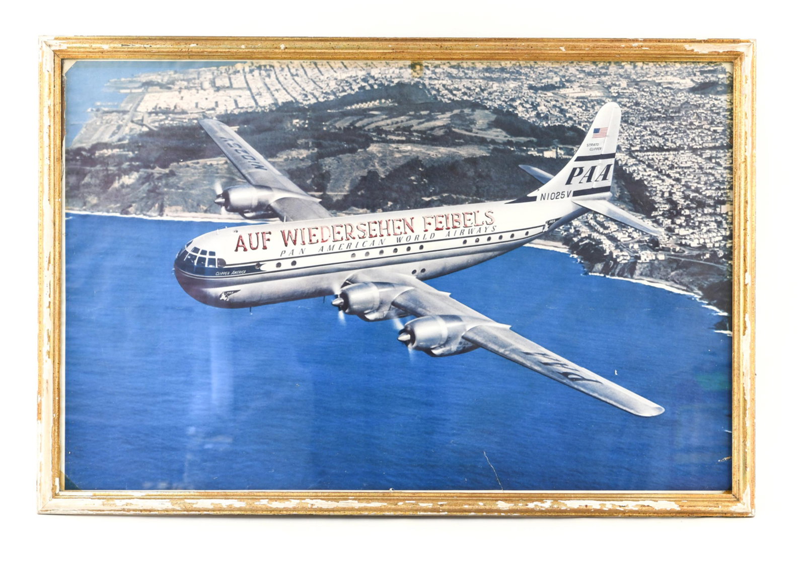 PHOTOGRAPH OF A PAN AMERICAN PLANE: Dimensions: (Frame) H 28" x W 42", (Sight) H 25.25" x W 39" Condition: Losses and wear to frame. Some tears, losses, and tape marks to paper.