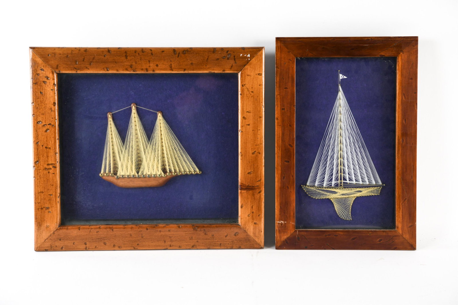 (2) MID-CENTURY SAILING SHIP STRING ART: Presented in shadow box frames. Apparently unsigned. Dimensions: (Larger frame) H 20" x W 22.5" Condition: Some rubbing to frames.
