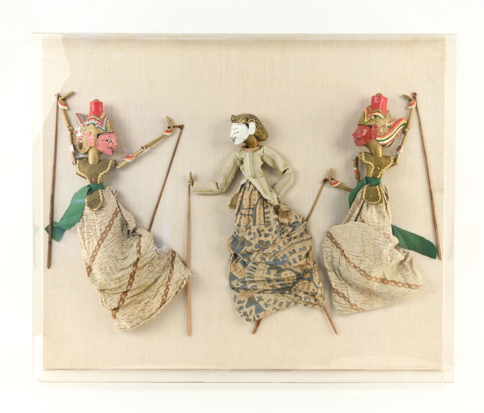 (3) VINTAGE INDONESIAN MARIONETTE PUPPETS: Dimensions: (Case) H 33" x W 40" x D 5" Condition: Wear consistent with age and use. Small loss to plexi case top, right. Breaks and losses to plexi box.